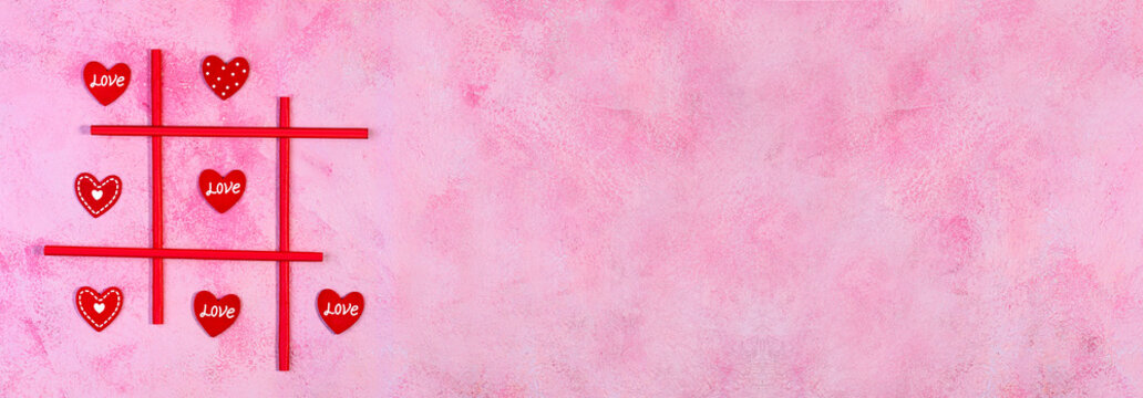 Valentine's day concept with hearts X-O game.