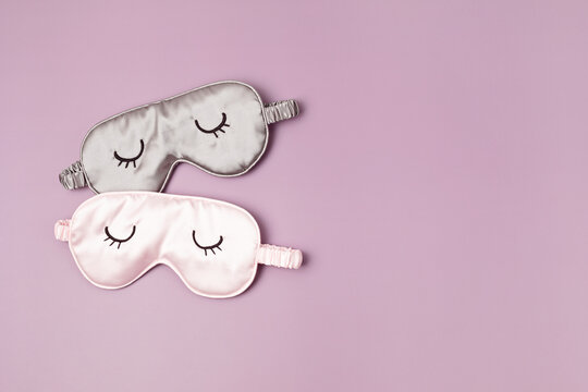 Two sleeping mask.  Minimal concept of rest, quality of sleep, good night, insomnia, relaxation. Flat lay, top view