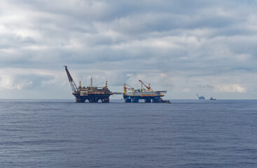 The P-40 Floating Oil Platform and the Dos Tiradentes Flotel attached by a Walkway together in the Albacora Field Offshore Brazil.