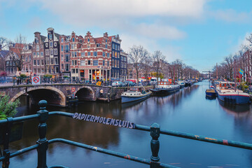 Amsterdam canals Netherlands, Amsterdam Holland during sunset evening during wintertime in the...