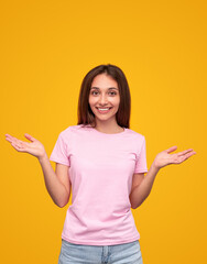 Excited young woman with hands apart