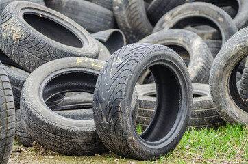 Novi Sad, Serbia - December 21. 2020: A pile of damaged, old, discarded, car tires for recycling