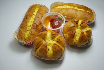 Garlic bread homemade isolation on white background with selective focus.