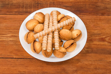 Nuts shape cookies and wafer tubes with different filling