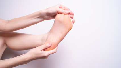 massage of leg muscles with hands, leg pain