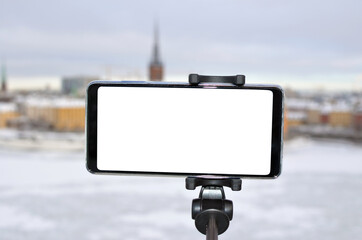 The landscape is filmed with a phone on a selfie stick