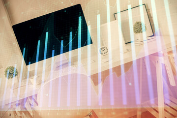 Double exposure of financial graph drawing and office interior background. Concept of stock market.