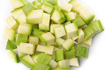 Close-up on a handful of chopped green squash