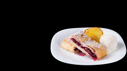 Cherry strudel isolated on black with copy space