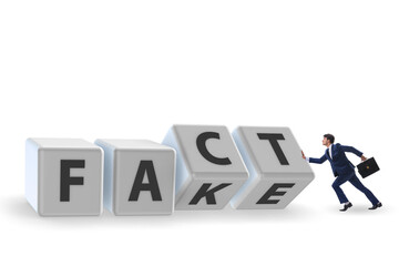 Face or fact concept with turning cubes