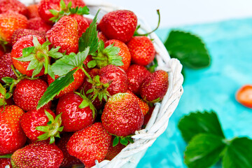 Strawberries in white basket. Fresh strawberries. Beautiful strawberries.