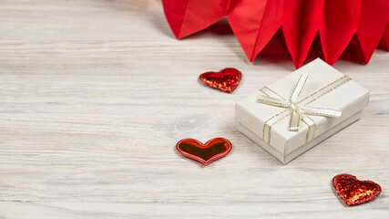 Gift box with red hearts. Happy Valentine's day. Text space