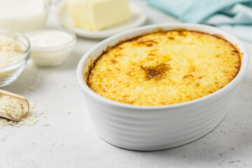 Stuffed rice casserole in a baking dish. Space for text.
