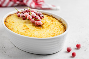 Rice pudding in a baking dish. Space for text.