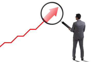 Concept of economic growth with chart and magnifying glass