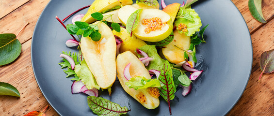 Healthy vegetarian salad with pear.