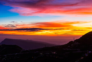 Twilight sky of mountain Phu Tub Berk, famous travel location beautiful sea fog at Thailand.