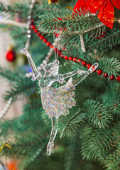 beautiful glass ballerina toy on christmas tree