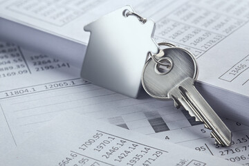 Real estate, keychain with house symbol. Key with finance blank.
