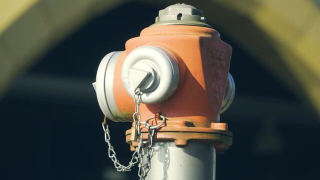 Close up, rusty red fire hydrant at sunny day.