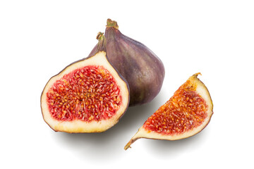 Purple ripe sliced and whole figs isolated on white background
