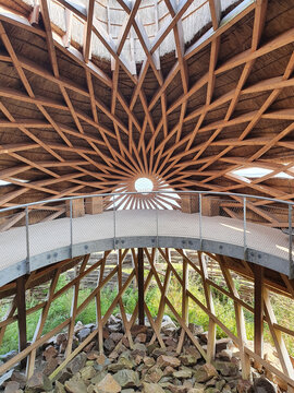Stellendam, The Netherlands, September 11, 2020: the spectacular interior space of Tij bird-watching observatory with its wooden construction and thatched cladding