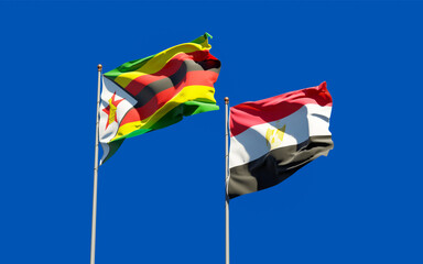 Flags of Zimbabwe and Egypt.