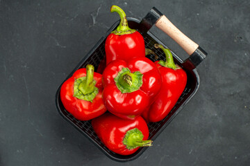 top view red bell-peppers spicy vegetables on a dark background hot color photo spice salad meal