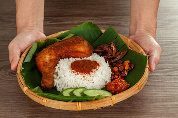 Nasi Kukus is a traditional delicacy originally from the East Coast of Peninsular Malaysia....