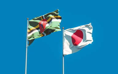 Flags of Japan and Dominica.