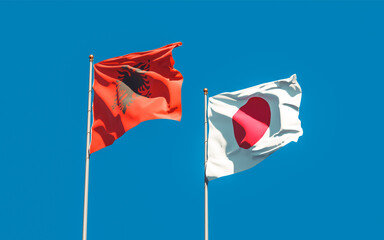 Flags of Japan and Albania.