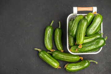 top view fresh green cucumbers inside basket on dark background color food health photo salad meal