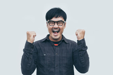 Naklejka premium adult asian man.young male wear eye glasses.posing smiling look excited surprised thinking positive happy joy life.empty,copy space for text advertising.white background.attractive fashion people