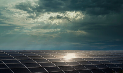 solar panels under cloudy and stormy sky