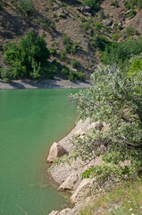 Fototapeta na wymiar Rocky slopes near Lake Panagia in Crimea on a sunny day