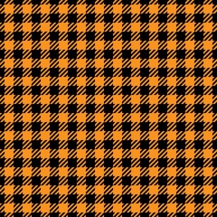 Black and orange houndstooth seamless pattern