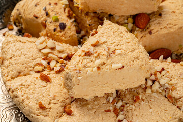Close up photo of halva dessert on silver plate