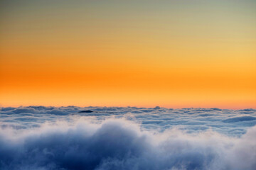 Alpine sea of clouds in sunset light
