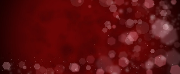 Festive bokeh on a red background. Merry christmas and Happy New Year. Background for the design.