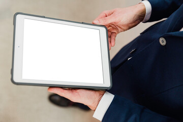 Businessman using a tablet with white background