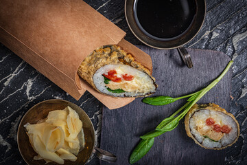 Still life. Japanese cuisine- roll in a package
