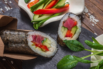 Still life. Japanese cuisine- roll in a package