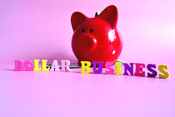 Business and finance concept. Dollar in the piggy bank and in the background. In the center is...