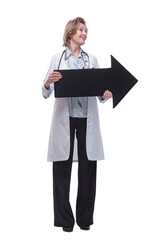 Friendly senior medical doctor pointing direction with arrow
