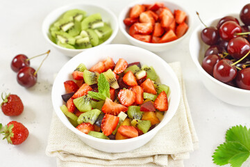 Healthy food fruit salad from kiwi and strawberry