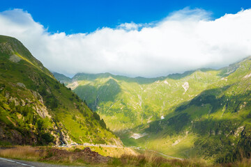 Romanian Carpathian mountains on a summer sunny day. Amaizing view on the mountains and cloudy sky...