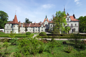 Fototapeta na wymiar Ancient castle in landscaped park in Chinadievo.