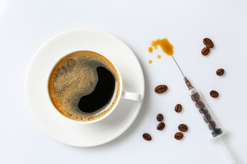 Cup of coffee and syringe with beans on white background, flat lay. Caffeine addiction concept