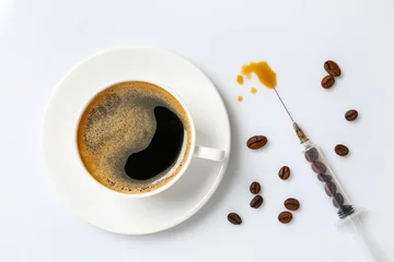 Papier Peint photo autocollant Bar a café Cup of coffee and syringe with beans on white background, flat lay. Caffeine addiction concept