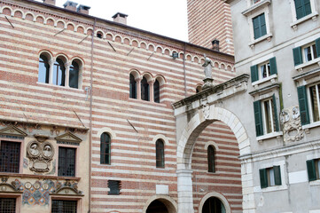 Obraz premium Historical buildings . Detail of the facade of the Palazzo della Ragione and Palazzo Domus Nova in the Piazza dei Signori, Verona, Italy.